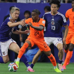 Japan fight back to hold the Netherlands in Group F opener